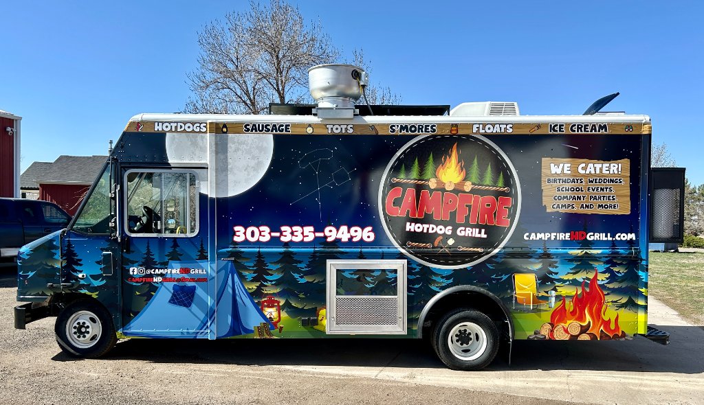 Front view of the Campfire Hotdog Grill truck with logo and signage.
