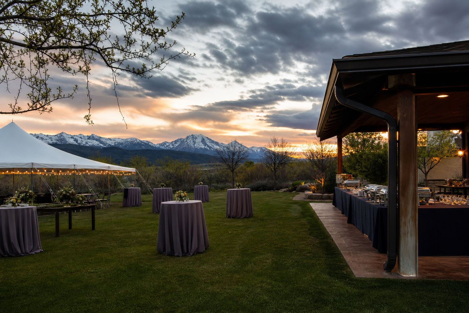 Tented outdoor event setup prepared for changing weather in Colorado