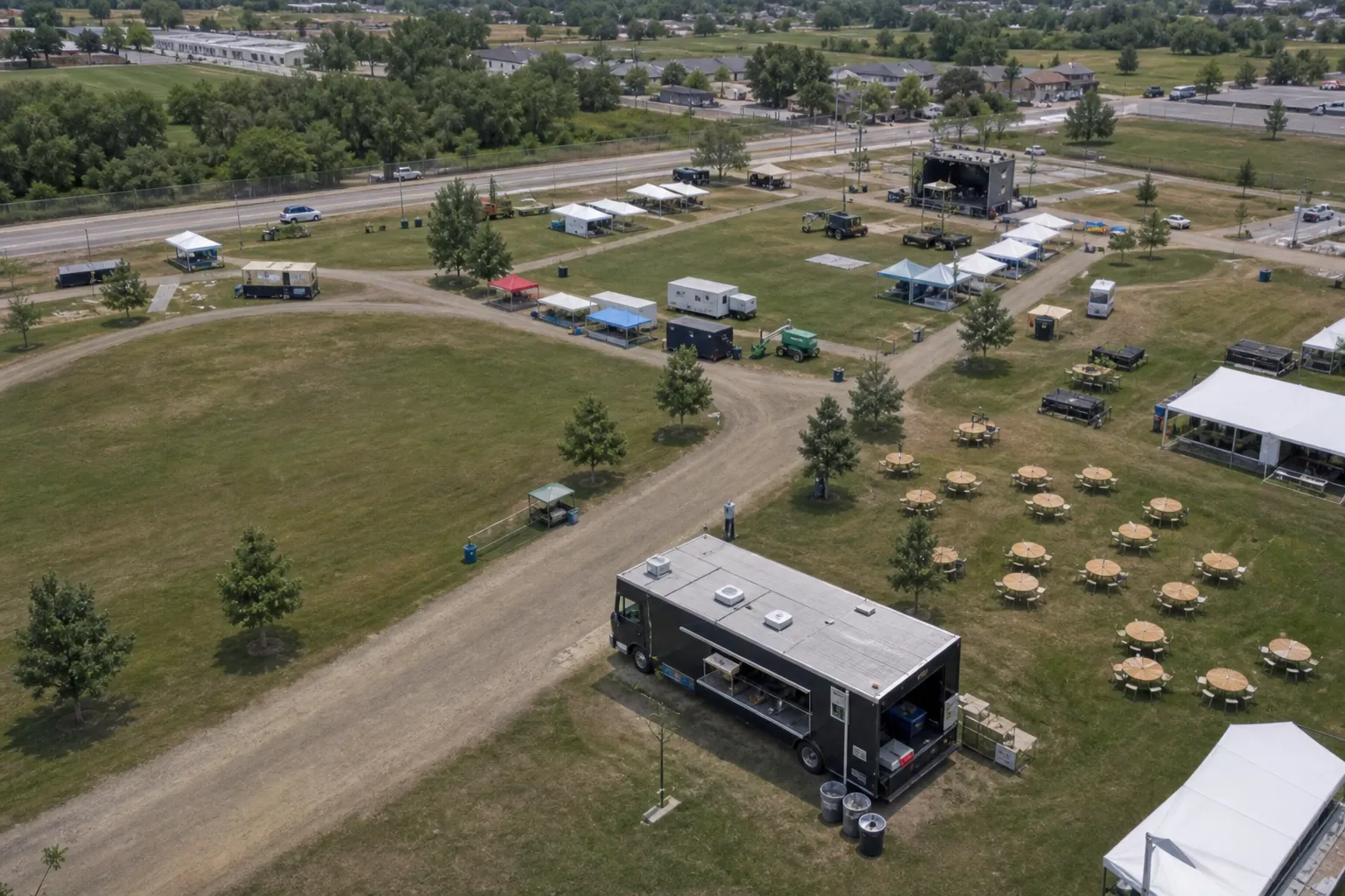 Vendor placement and guest flow layout for a community festival in Dacono