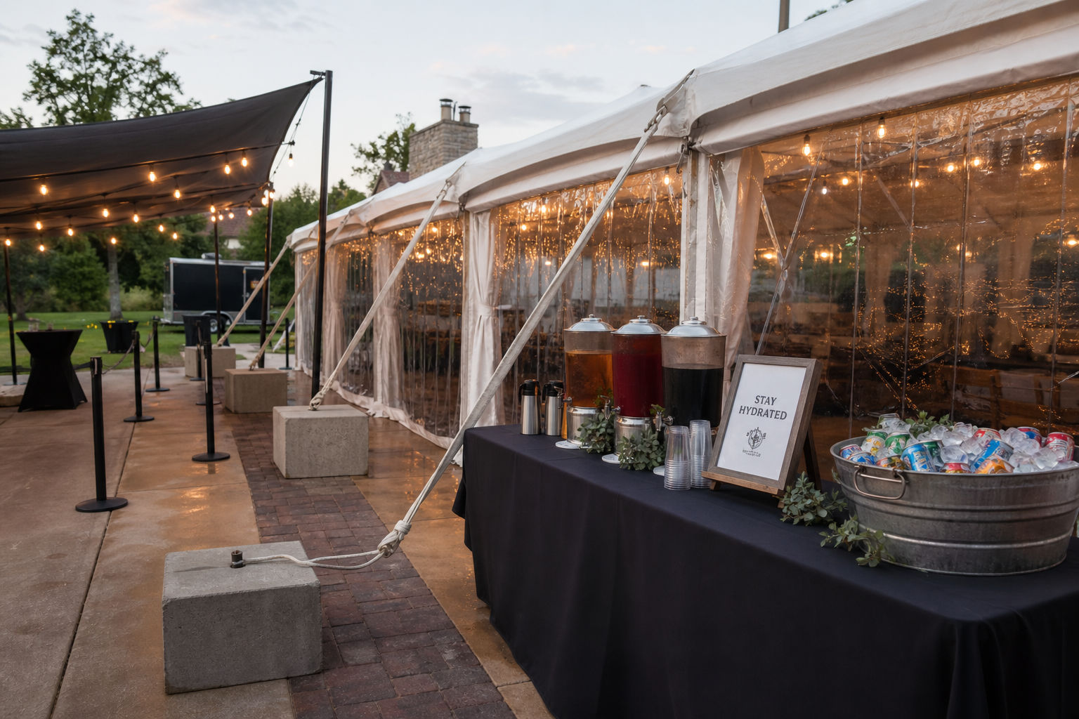 Weather-ready mobile catering setup with tenting and guest comfort features