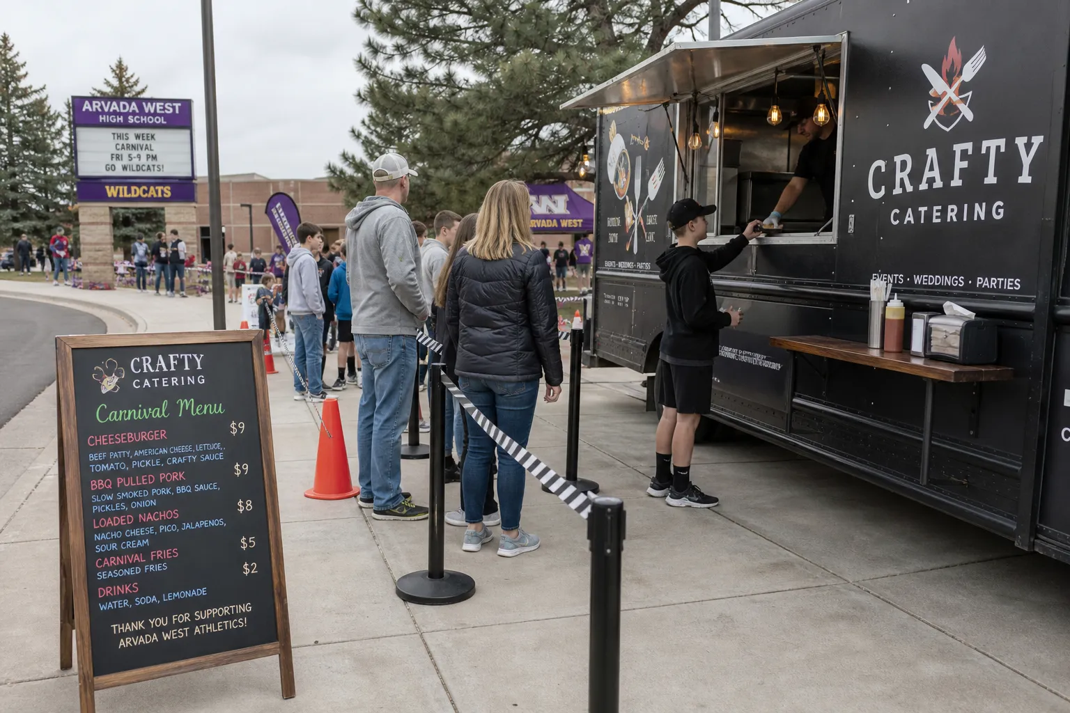 Organized mobile caterer line setup for a school carnival in Arvada
