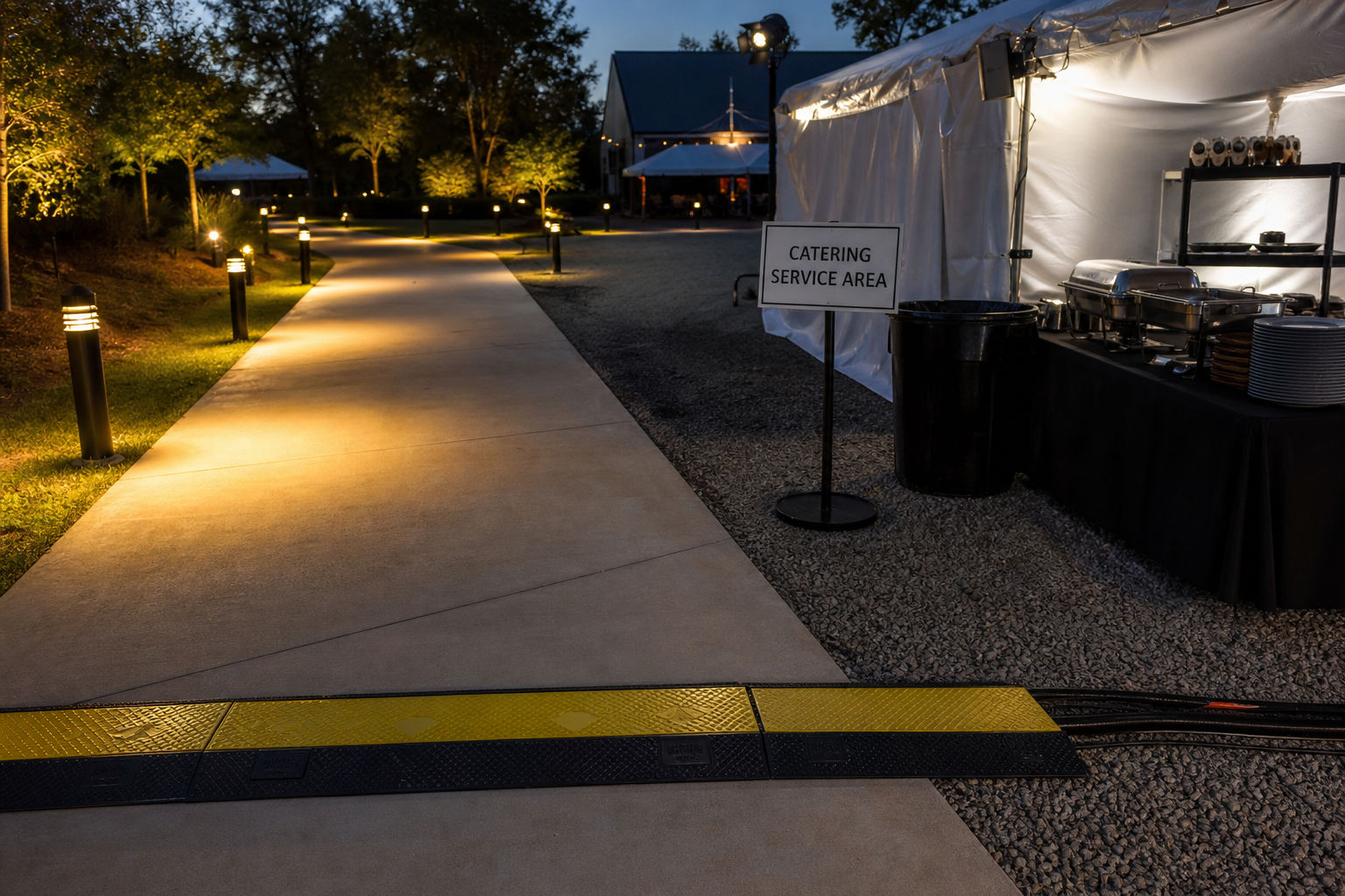 Safe lighting and extension cord routing for an evening catered event