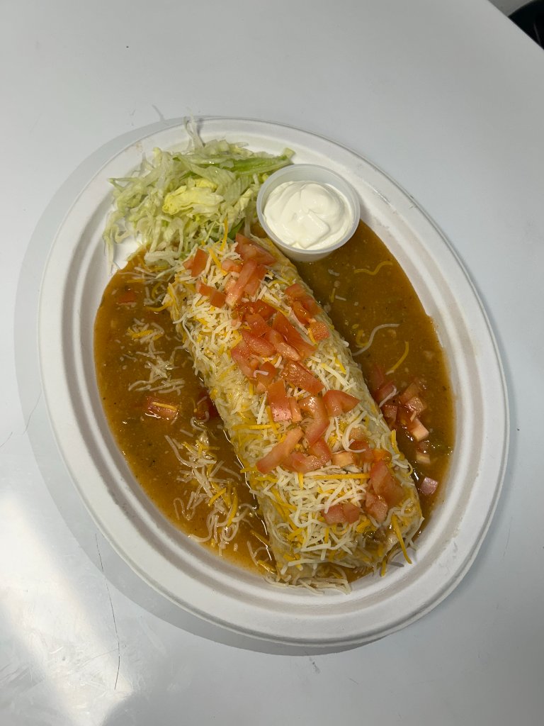 Crispy quesadilla served with guacamole, sour cream and salsa verde.