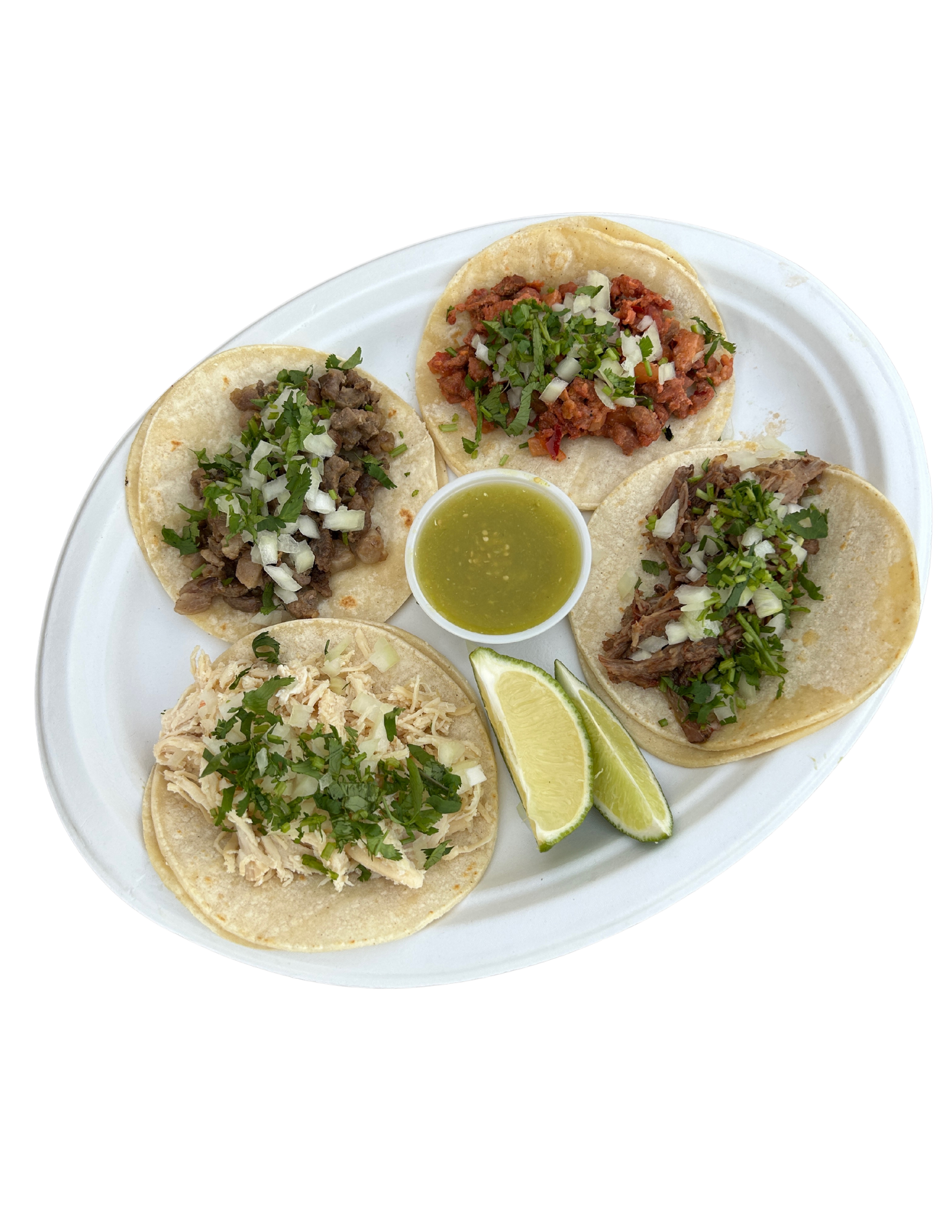 Delicious assortment of tacos served with lime and salsa.